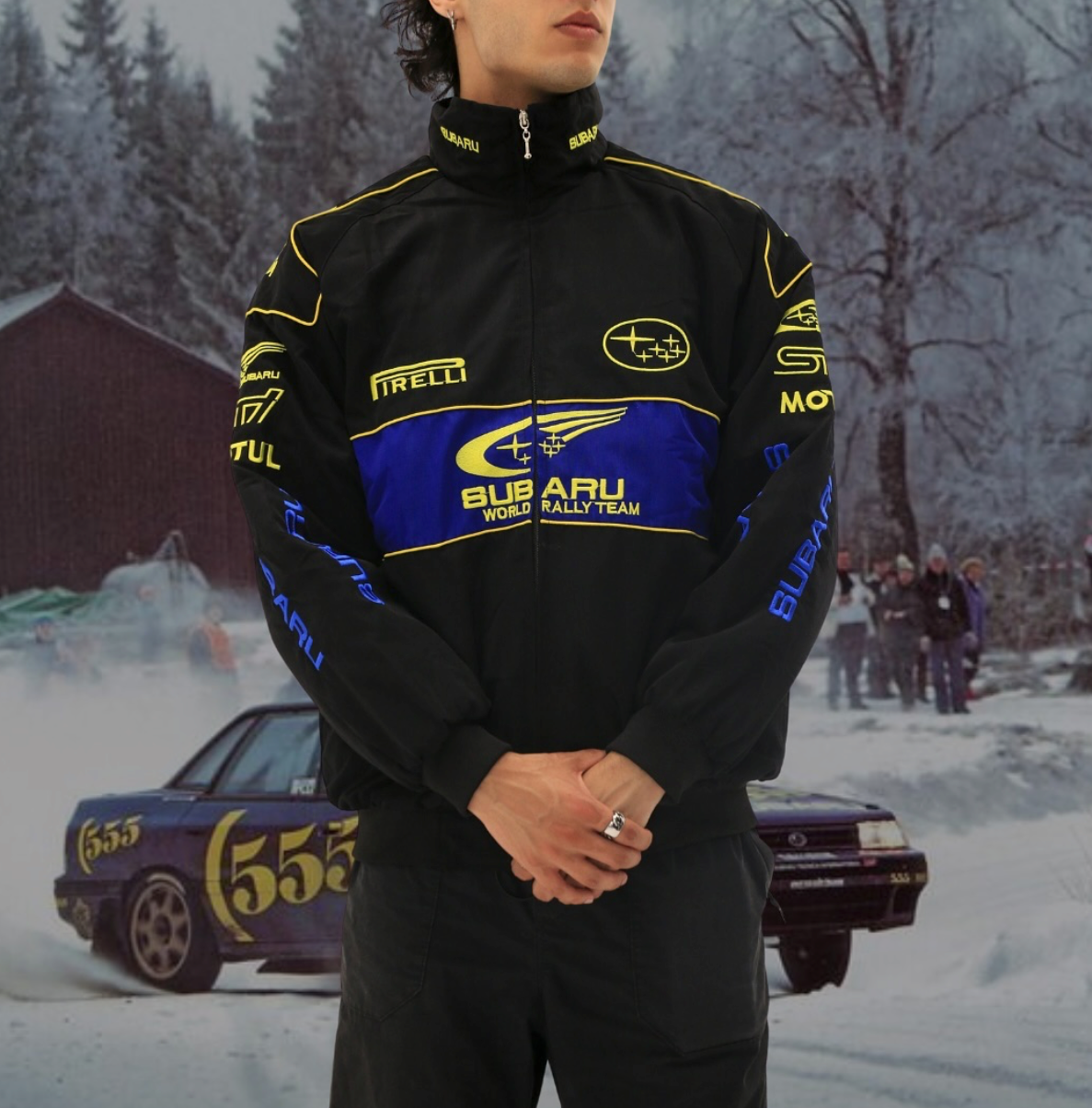Subaru World Rally Team Vintage Racing Jacket – black with yellow and blue detailing, retro motorsport style shown front and back.
