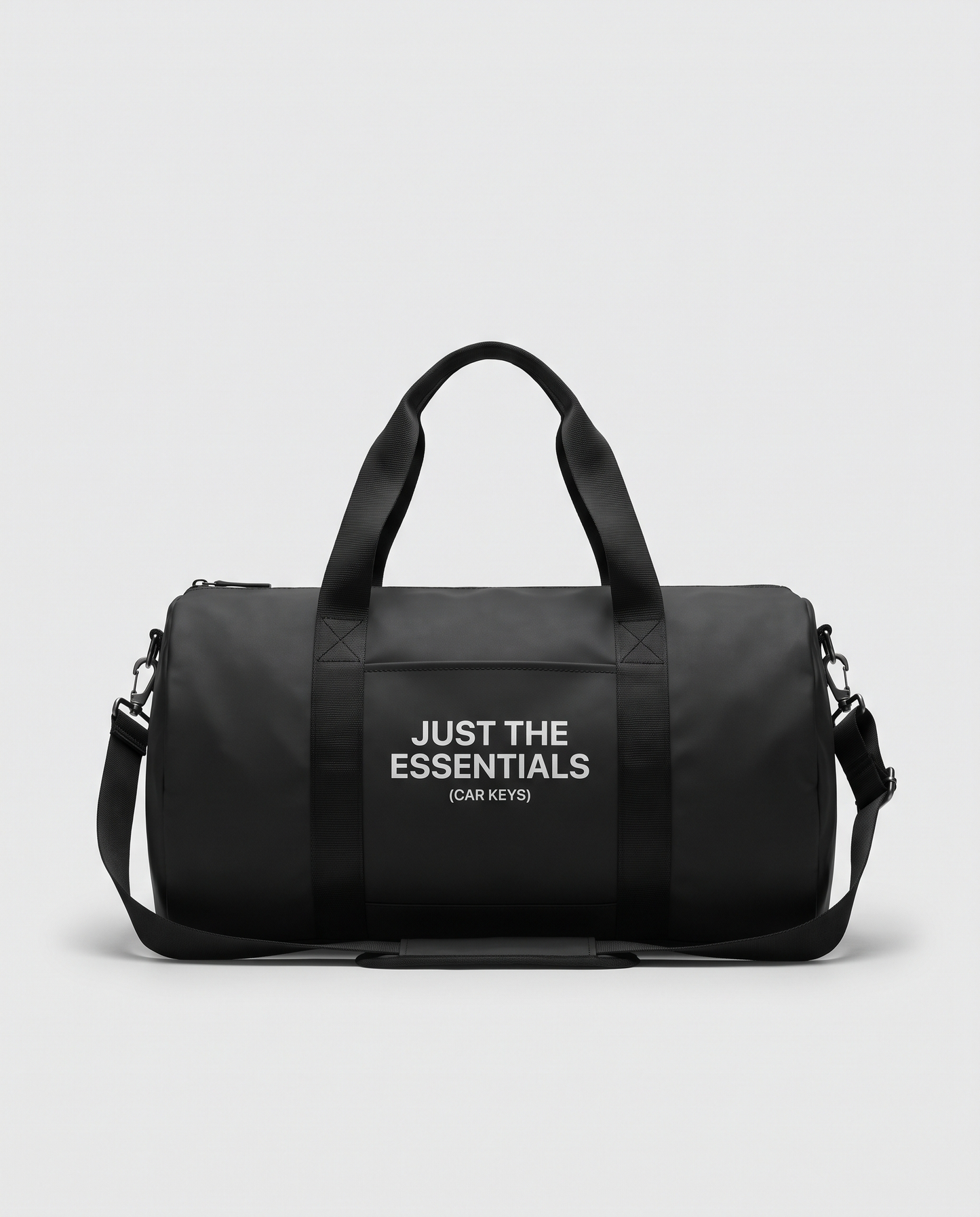 Just the Essentials black duffle bag — studio hero