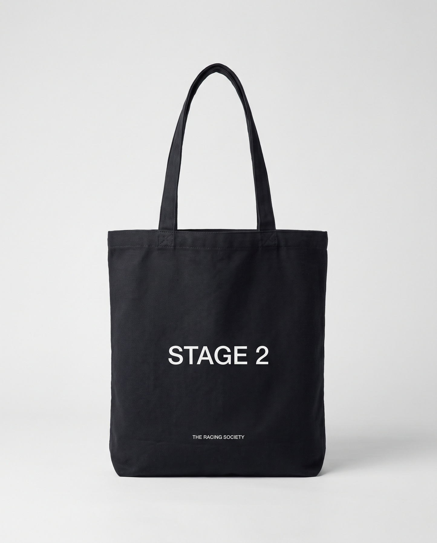 Stage 2 black eco tote — studio hero
