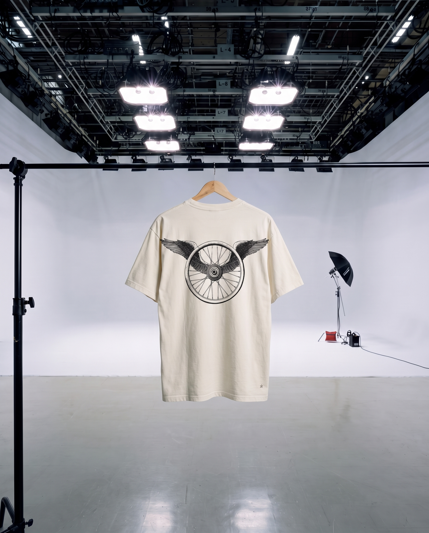 Winged Wheel — hanger